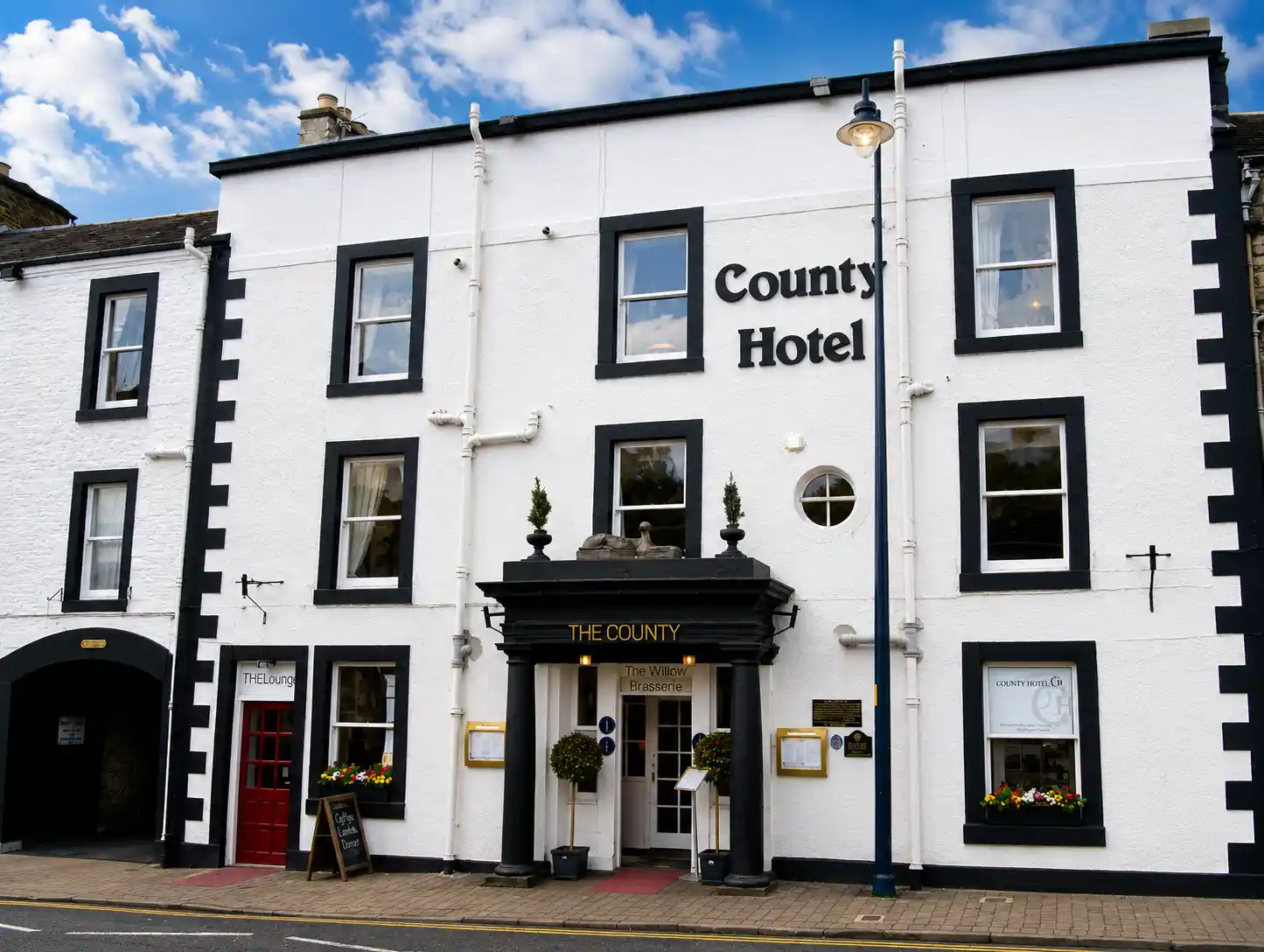 The County Hotel facade on a sunny day